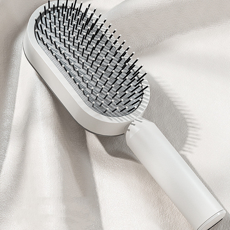 The Serenity Glide: One-Key Self-Cleaning Detangler & Scalp Massager Brush Feminé Luxé