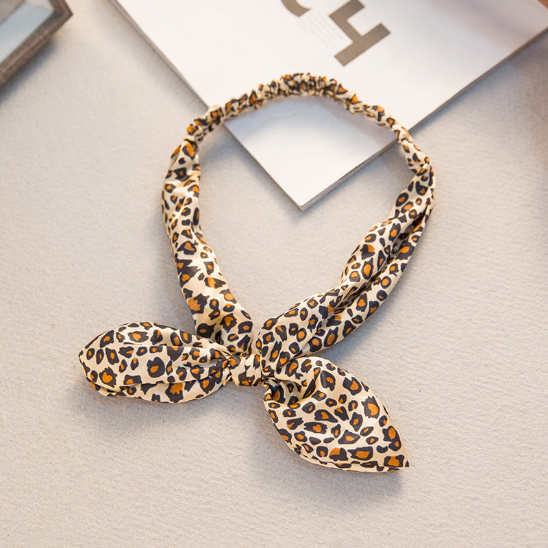 The Parisian Bow Headband: Chic Fabric Knot & Bunny Ear Tie - Designer Print Hair Accessory for Effortless French Style Feminé Luxé