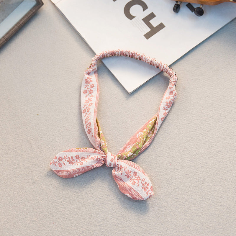 The Parisian Bow Headband: Chic Fabric Knot & Bunny Ear Tie - Designer Print Hair Accessory for Effortless French Style Feminé Luxé