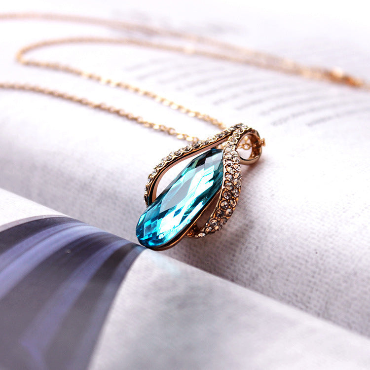 Peacock Blue Gold-Plated Angel Wing Crystal Necklace & Earrings Set Feminé Luxé