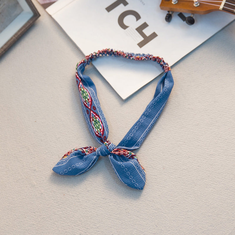 The Parisian Bow Headband: Chic Fabric Knot & Bunny Ear Tie - Designer Print Hair Accessory for Effortless French Style Feminé Luxé
