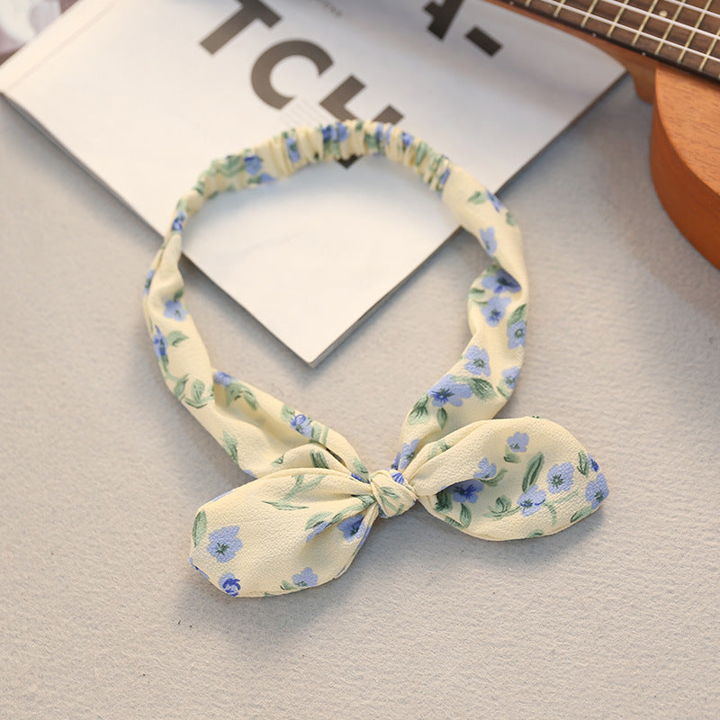 The Parisian Bow Headband: Chic Fabric Knot & Bunny Ear Tie - Designer Print Hair Accessory for Effortless French Style Feminé Luxé