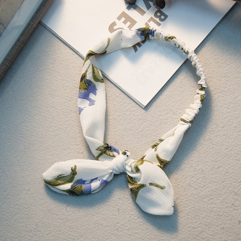 The Parisian Bow Headband: Chic Fabric Knot & Bunny Ear Tie - Designer Print Hair Accessory for Effortless French Style Feminé Luxé