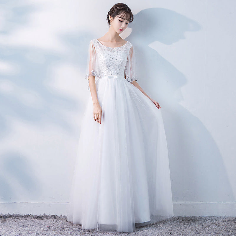 Elegant White Chiffon Evening Gown with Sheer Sleeves Feminé Luxé