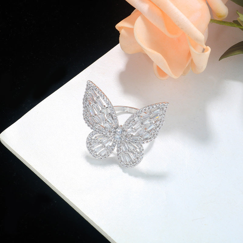 Feminé Luxé Exclusive Dazzling Micro-Pave Butterfly Statement Ring: Silver-Toned, Diamond-Treated Adjustable Finger Ring Feminé Luxé
