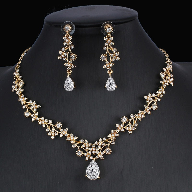 Delicate Golden Zircon Floral Two-Piece Jewelry Set: Wedding Necklace & Dangling Earrings for Ethereal Elegance Feminé Luxé