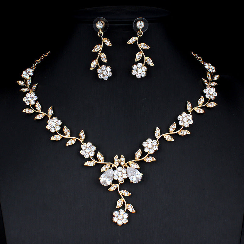 Delicate Golden Zircon Floral Two-Piece Jewelry Set: Wedding Necklace & Dangling Earrings for Ethereal Elegance Feminé Luxé