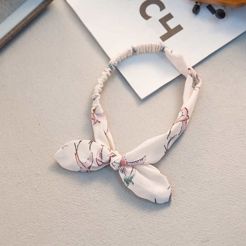 The Parisian Bow Headband: Chic Fabric Knot & Bunny Ear Tie - Designer Print Hair Accessory for Effortless French Style Feminé Luxé