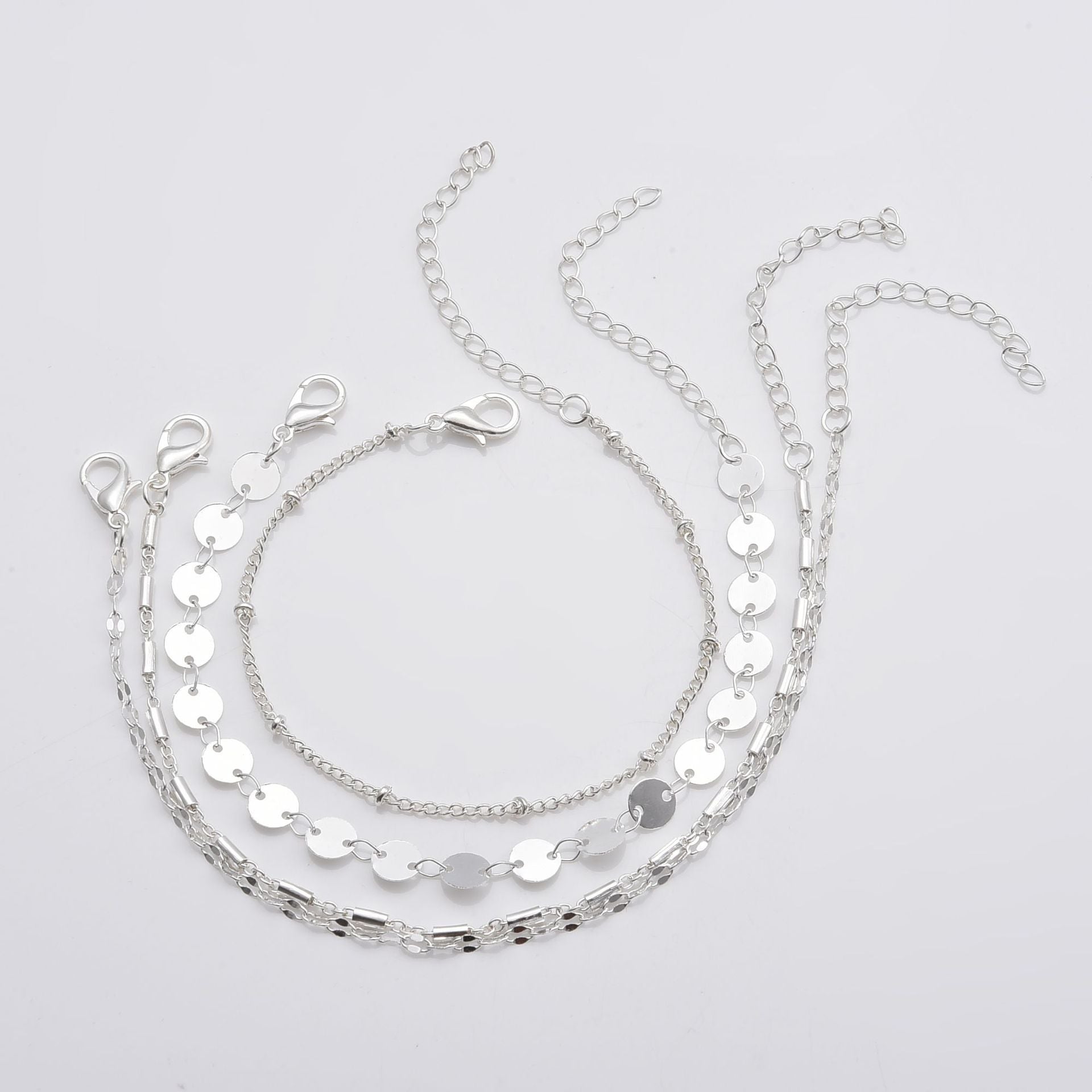 Chic Minimalist 4-Piece Gold Tone Layering Bracelet Stack with Disc & Tube Charms Feminé Luxé