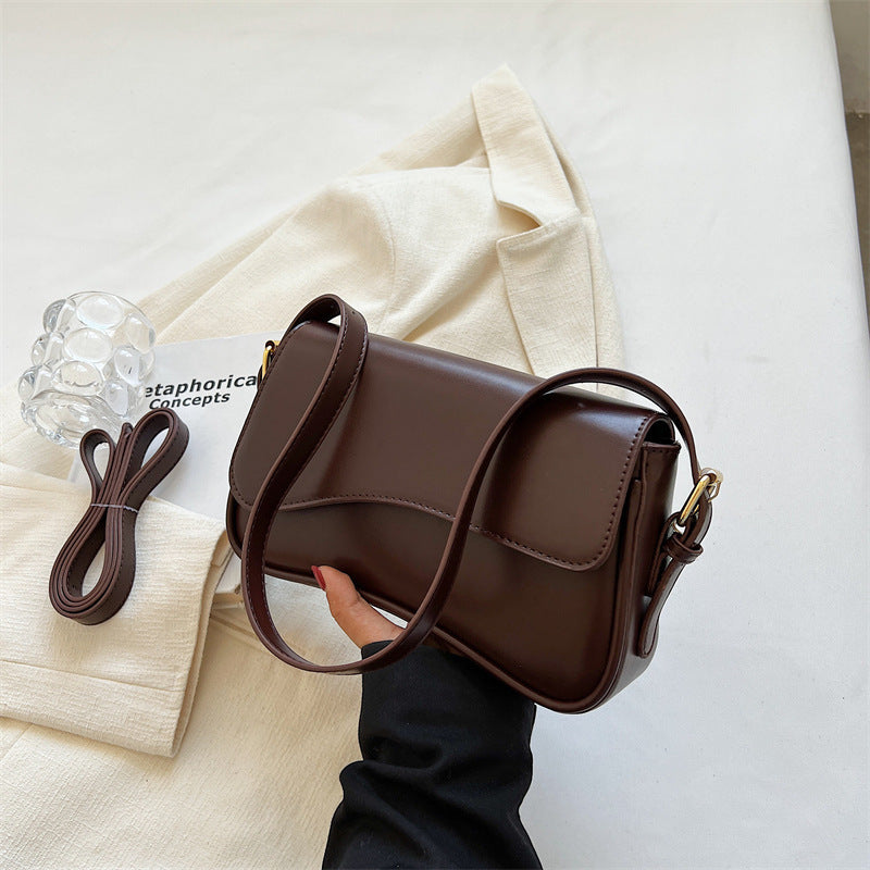 The "Equestrian Curve" Saddle Bag Feminé Luxé