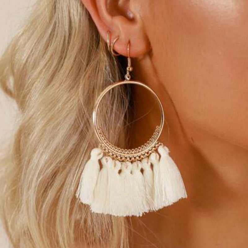 Bohemian Grande Tassel Hoop Earrings | Hand-Woven Fringe Dangles in Geometric Gold Finish Feminé Luxé