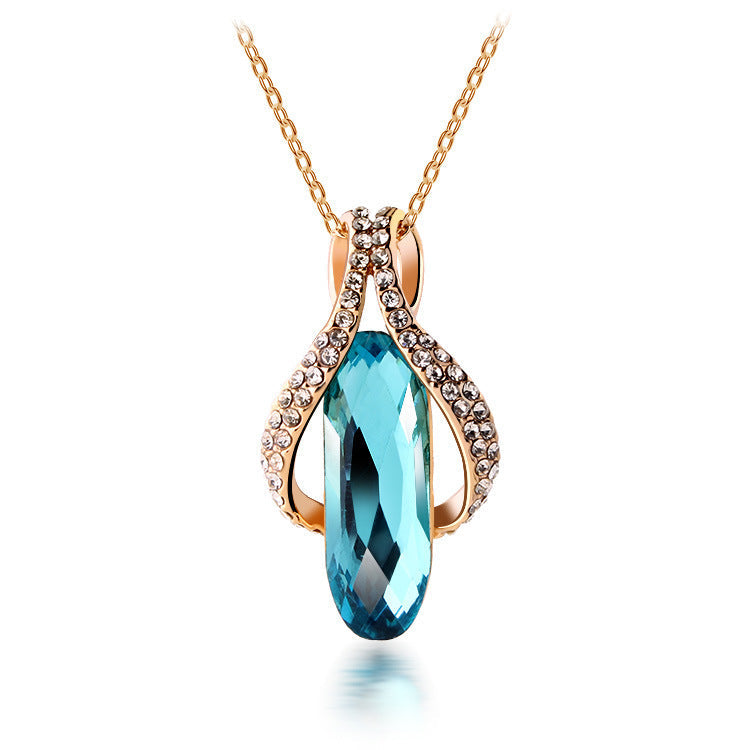 Peacock Blue Gold-Plated Angel Wing Crystal Necklace & Earrings Set Feminé Luxé