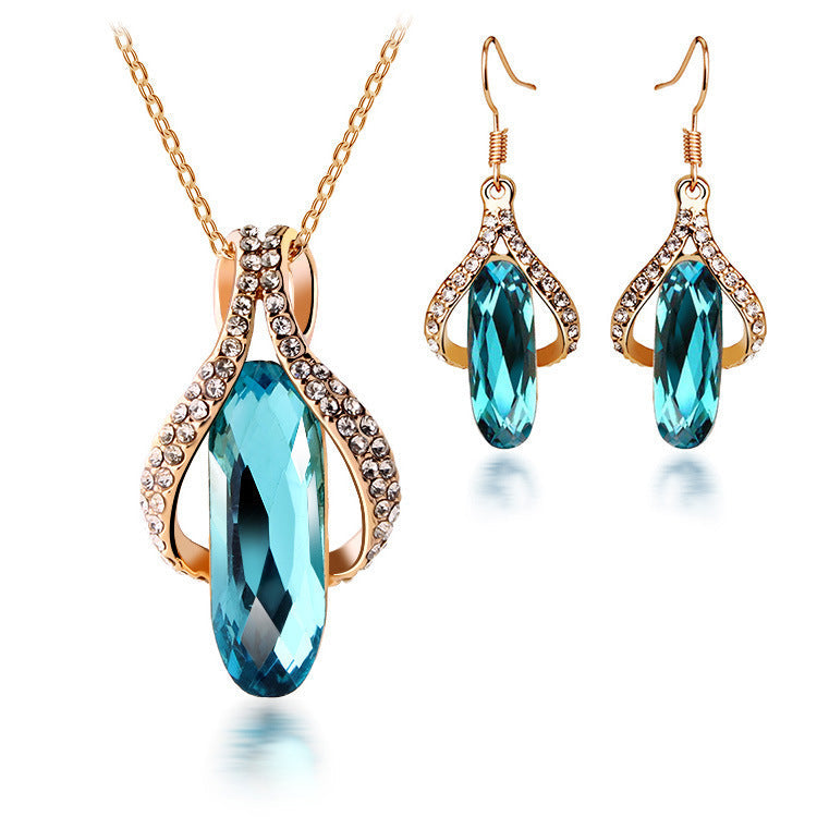 Peacock Blue Gold-Plated Angel Wing Crystal Necklace & Earrings Set Feminé Luxé