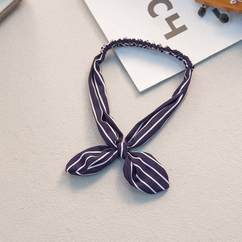 The Parisian Bow Headband: Chic Fabric Knot & Bunny Ear Tie - Designer Print Hair Accessory for Effortless French Style Feminé Luxé