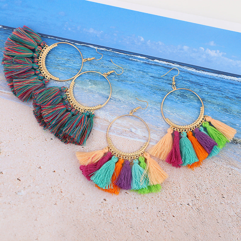 Bohemian Grande Tassel Hoop Earrings | Hand-Woven Fringe Dangles in Geometric Gold Finish Feminé Luxé