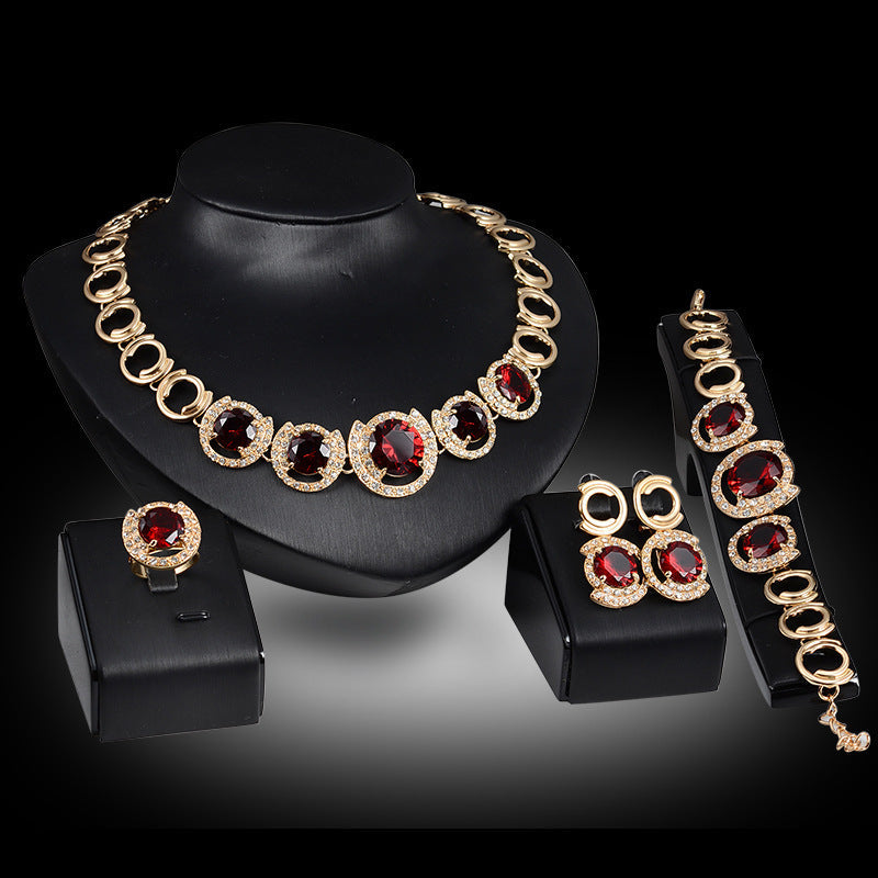 Royal Emerald/Ruby Zircon Gold-Tone Bridal Set: Vintage-Inspired Necklace, Ring, Earrings & Bracelet for Timeless Grandeur Feminé Luxé
