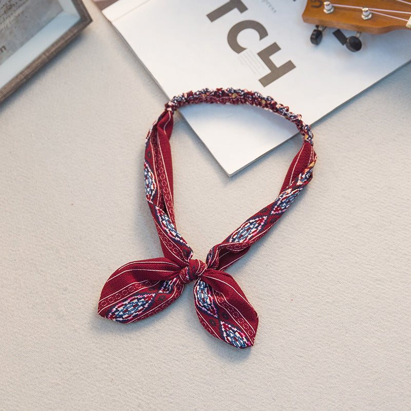 The Parisian Bow Headband: Chic Fabric Knot & Bunny Ear Tie - Designer Print Hair Accessory for Effortless French Style Feminé Luxé