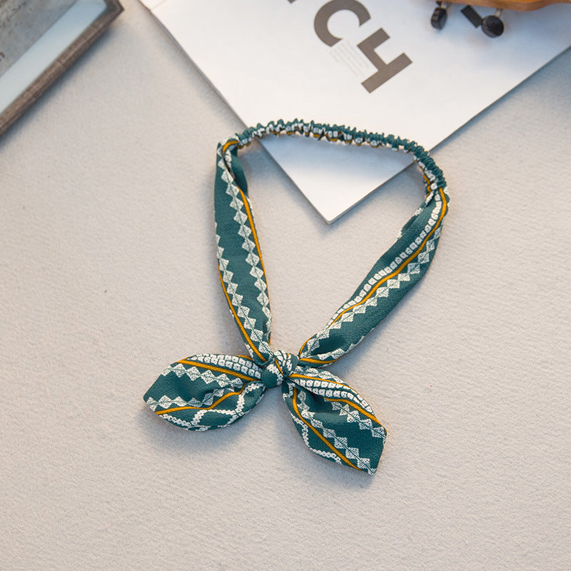 The Parisian Bow Headband: Chic Fabric Knot & Bunny Ear Tie - Designer Print Hair Accessory for Effortless French Style Feminé Luxé