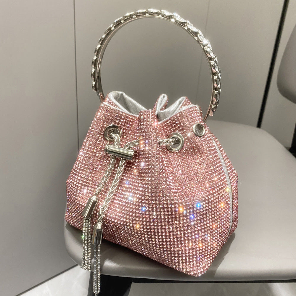 The Starlight Pouch: Full-Crystal Embellished Evening Drawstring Bag | Glamorous Metallic Ring Handle Feminé Luxé