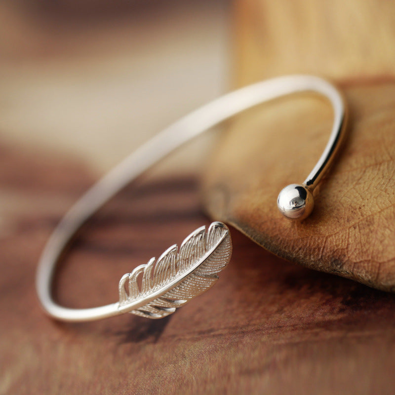The Sterling Silver Feather Cuff Bracelet Feminé Luxé