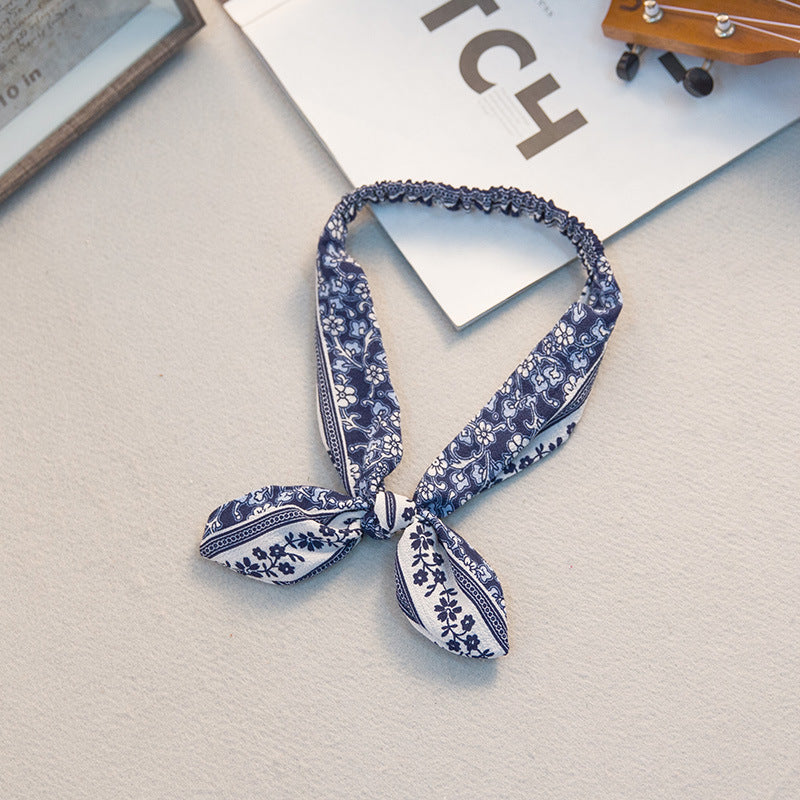 The Parisian Bow Headband: Chic Fabric Knot & Bunny Ear Tie - Designer Print Hair Accessory for Effortless French Style Feminé Luxé