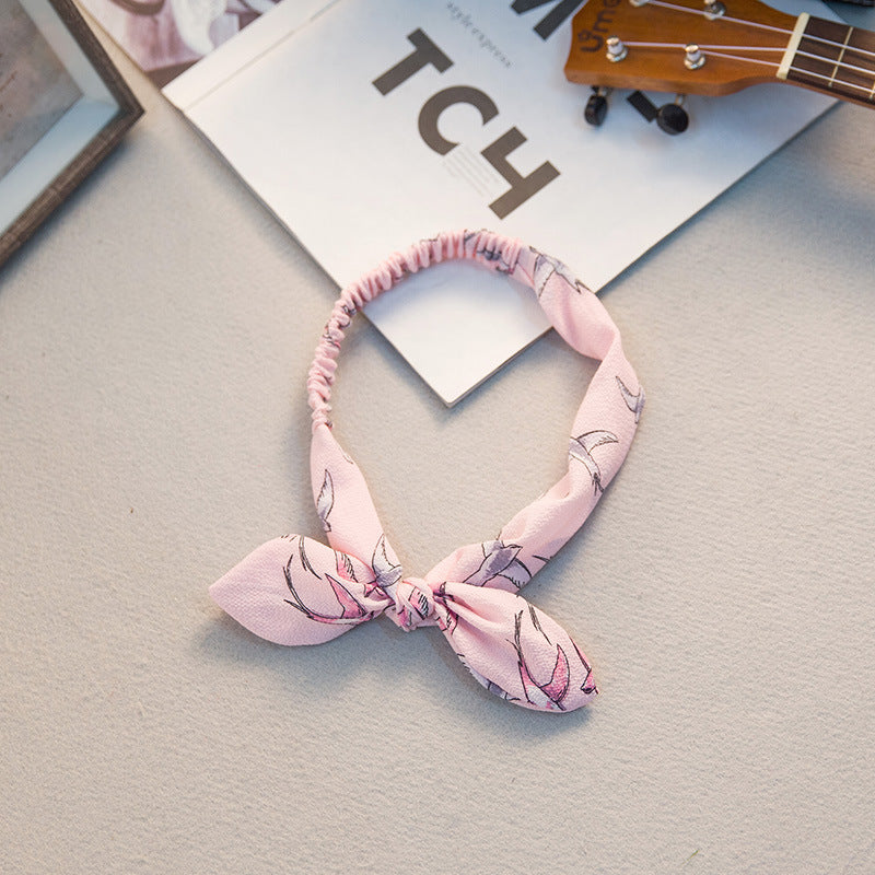The Parisian Bow Headband: Chic Fabric Knot & Bunny Ear Tie - Designer Print Hair Accessory for Effortless French Style Feminé Luxé