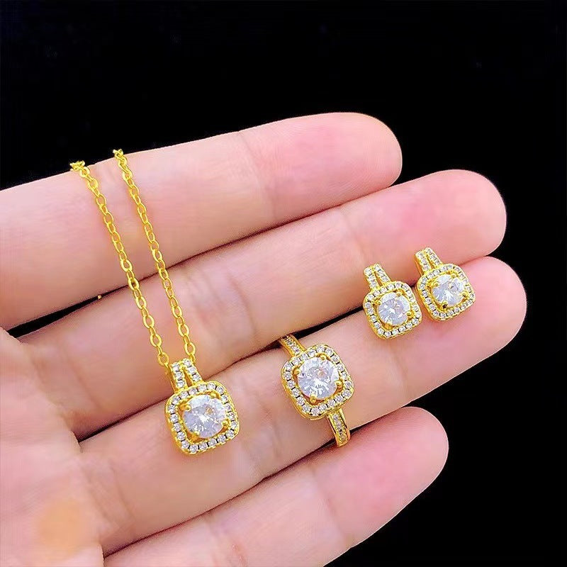 Opulent Zirconia Dazzle Jewelry Set - Gold Plated Statement Necklace, Studs & Ring Feminé Luxé