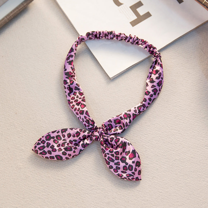 The Parisian Bow Headband: Chic Fabric Knot & Bunny Ear Tie - Designer Print Hair Accessory for Effortless French Style Feminé Luxé