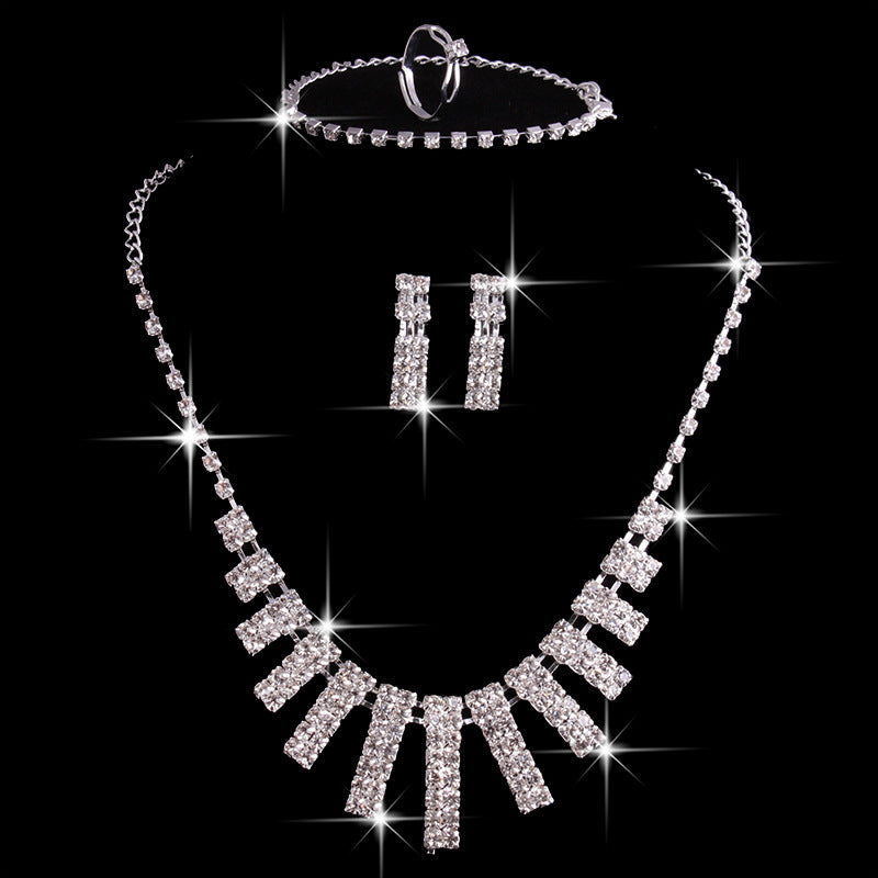 Exquisite 4-Piece Rhinestone Bridal Jewelry Set: Dazzling Necklace, Earrings, Ring & Bracelet Feminé Luxé