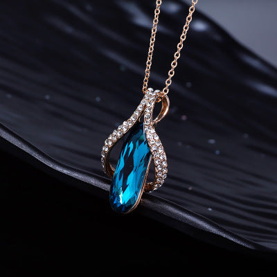 Peacock Blue Gold-Plated Angel Wing Crystal Necklace & Earrings Set Feminé Luxé