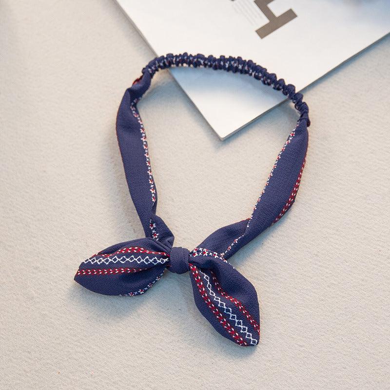 The Parisian Bow Headband: Chic Fabric Knot & Bunny Ear Tie - Designer Print Hair Accessory for Effortless French Style Feminé Luxé