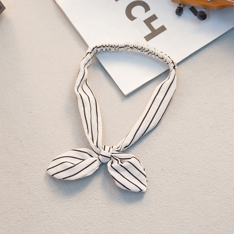 The Parisian Bow Headband: Chic Fabric Knot & Bunny Ear Tie - Designer Print Hair Accessory for Effortless French Style Feminé Luxé