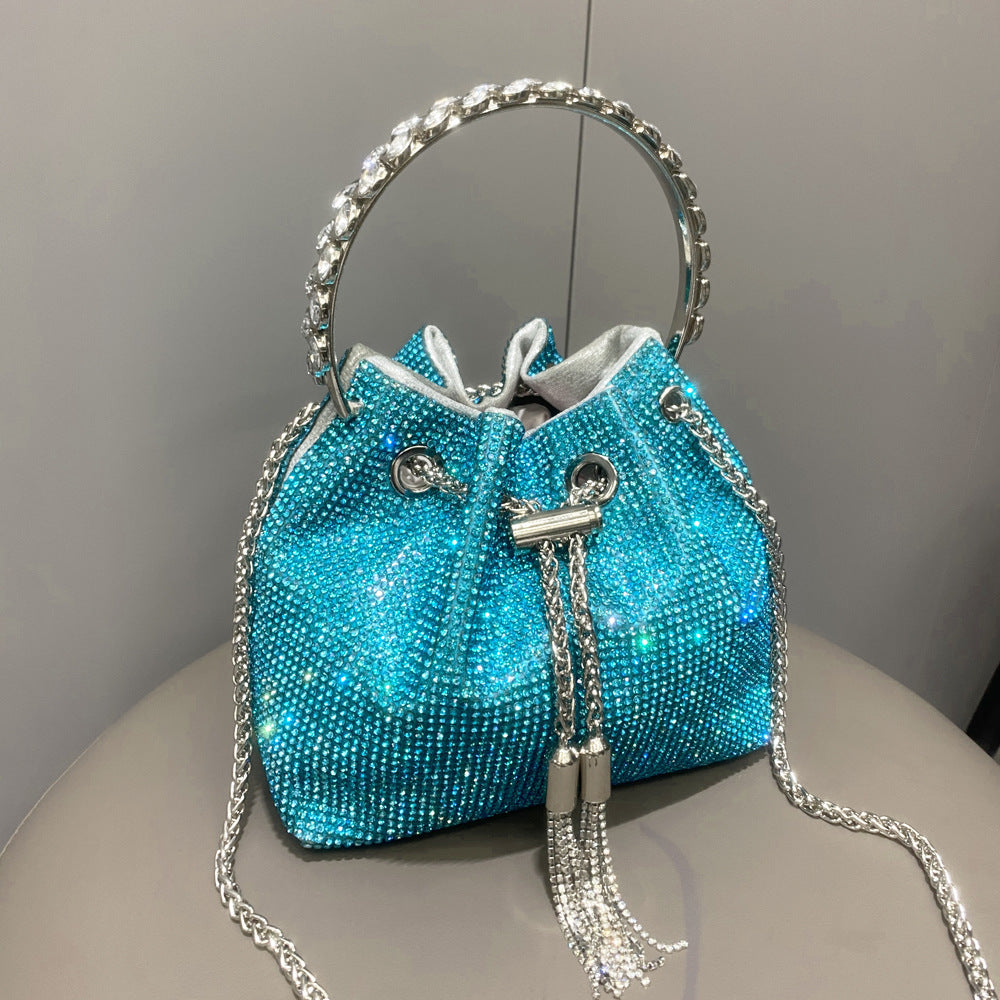 The Starlight Pouch: Full-Crystal Embellished Evening Drawstring Bag | Glamorous Metallic Ring Handle Feminé Luxé