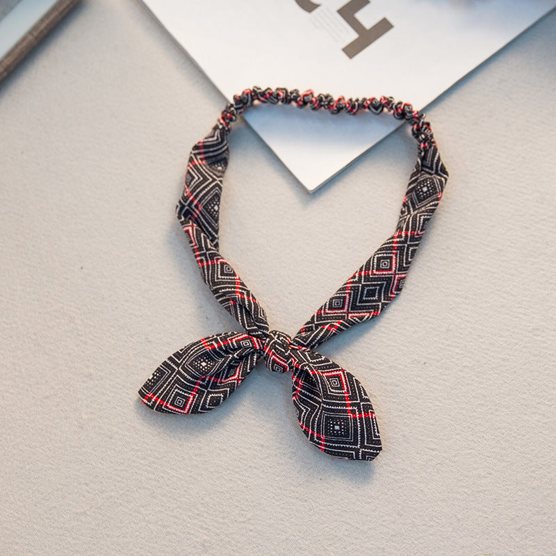 The Parisian Bow Headband: Chic Fabric Knot & Bunny Ear Tie - Designer Print Hair Accessory for Effortless French Style Feminé Luxé