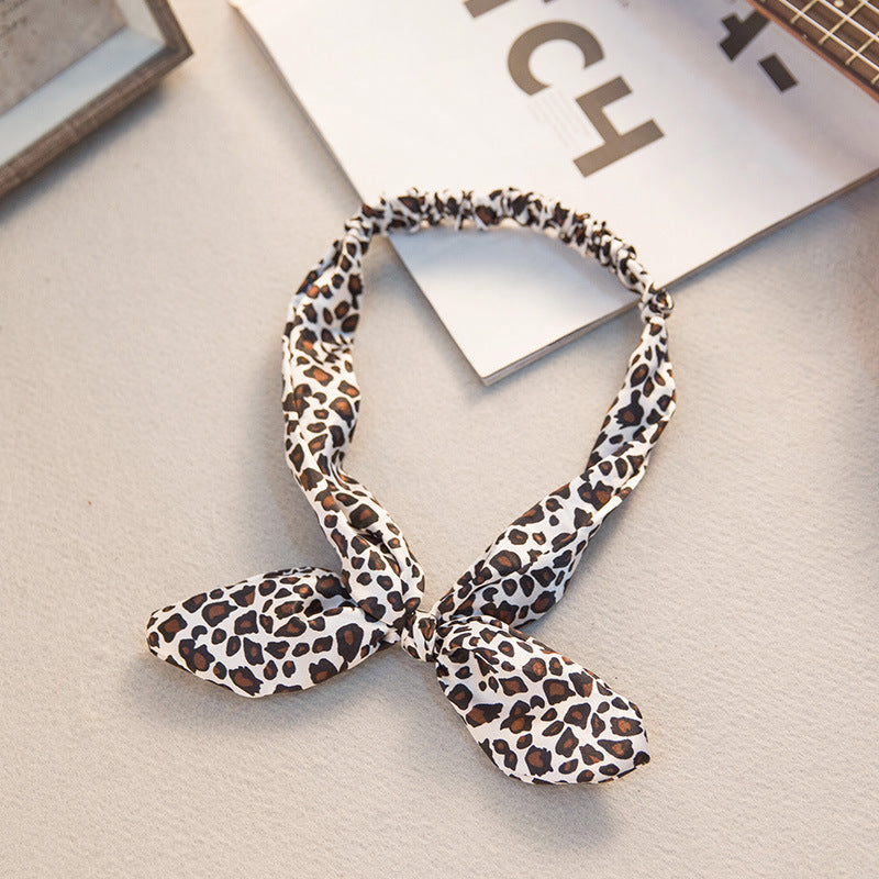 The Parisian Bow Headband: Chic Fabric Knot & Bunny Ear Tie - Designer Print Hair Accessory for Effortless French Style Feminé Luxé