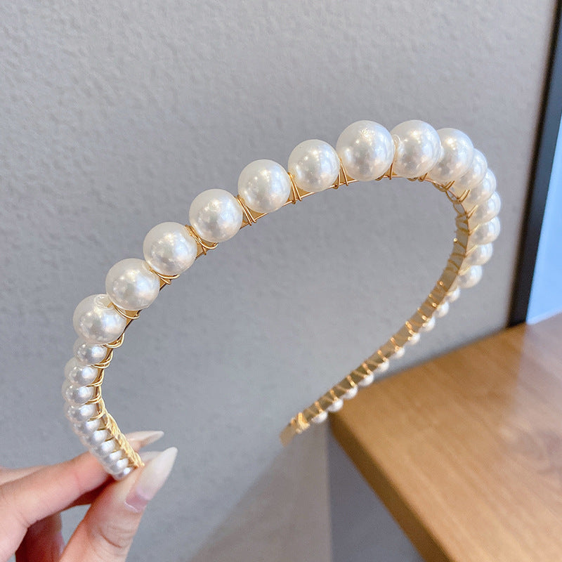 The Versailles Braid: Multi-Row Faux Pearl Headband - Elegant Woven Hair Accessory for Timeless Grace Feminé Luxé