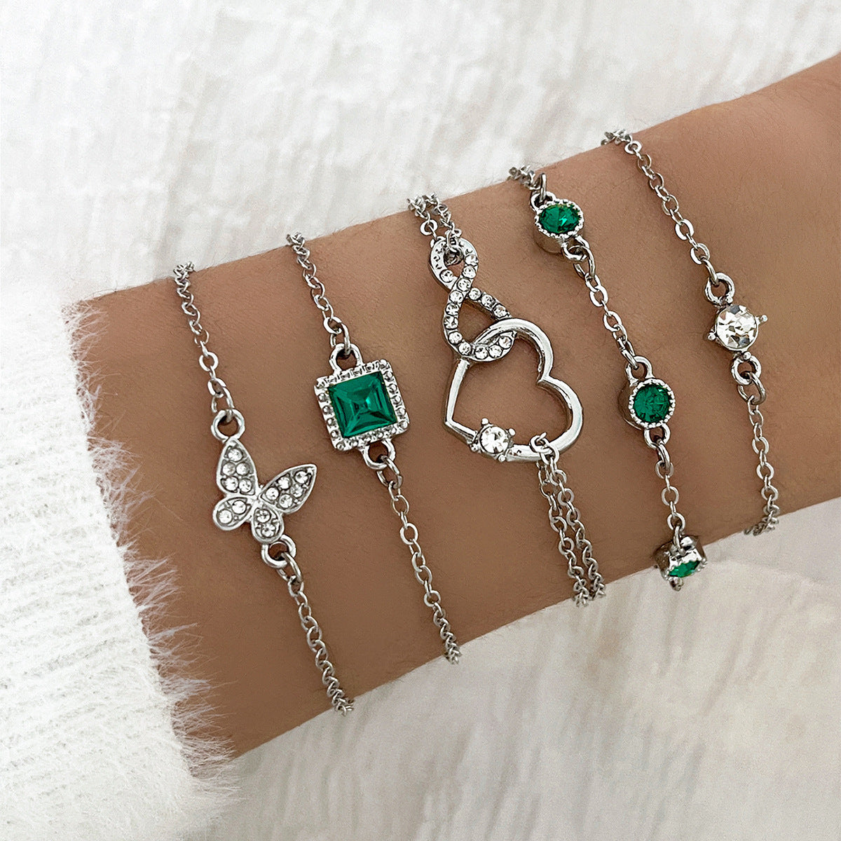 Bohemian 6-Piece Green Crystal Layering Bracelet Stack with Heart & Butterfly Charms Feminé Luxé