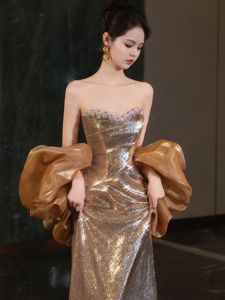 Golden Metallic Strapless Evening Gown with Dramatic Bow Feminé Luxé