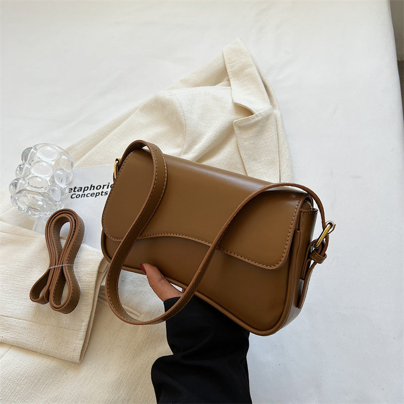 The "Equestrian Curve" Saddle Bag Feminé Luxé