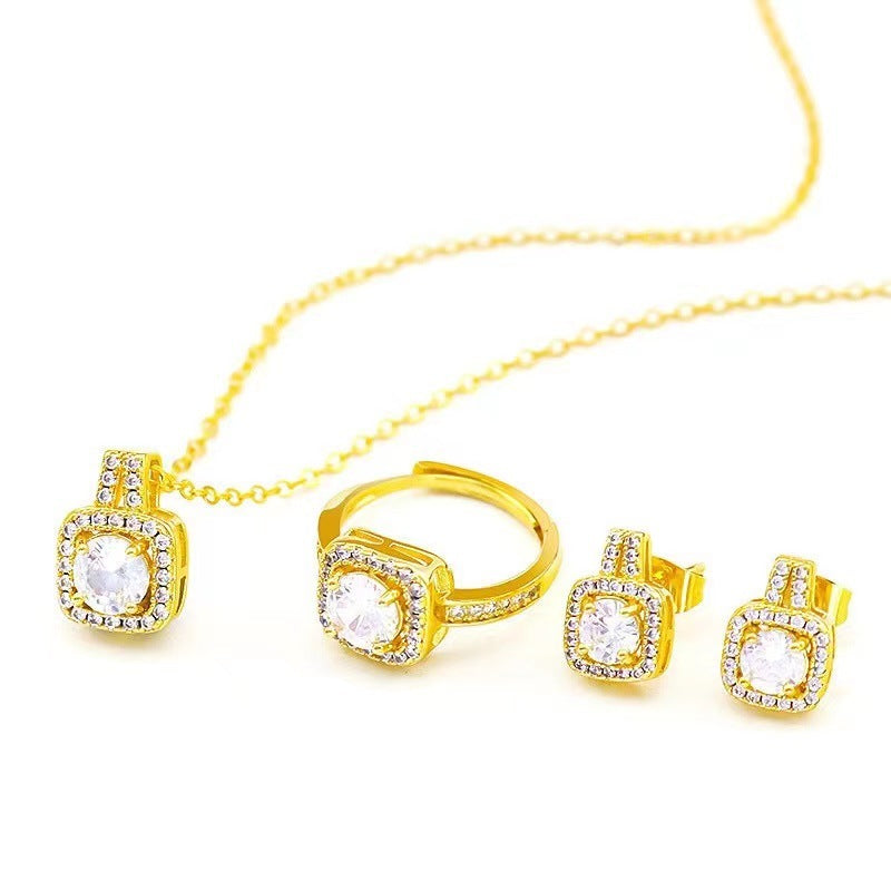 Opulent Zirconia Dazzle Jewelry Set - Gold Plated Statement Necklace, Studs & Ring Feminé Luxé
