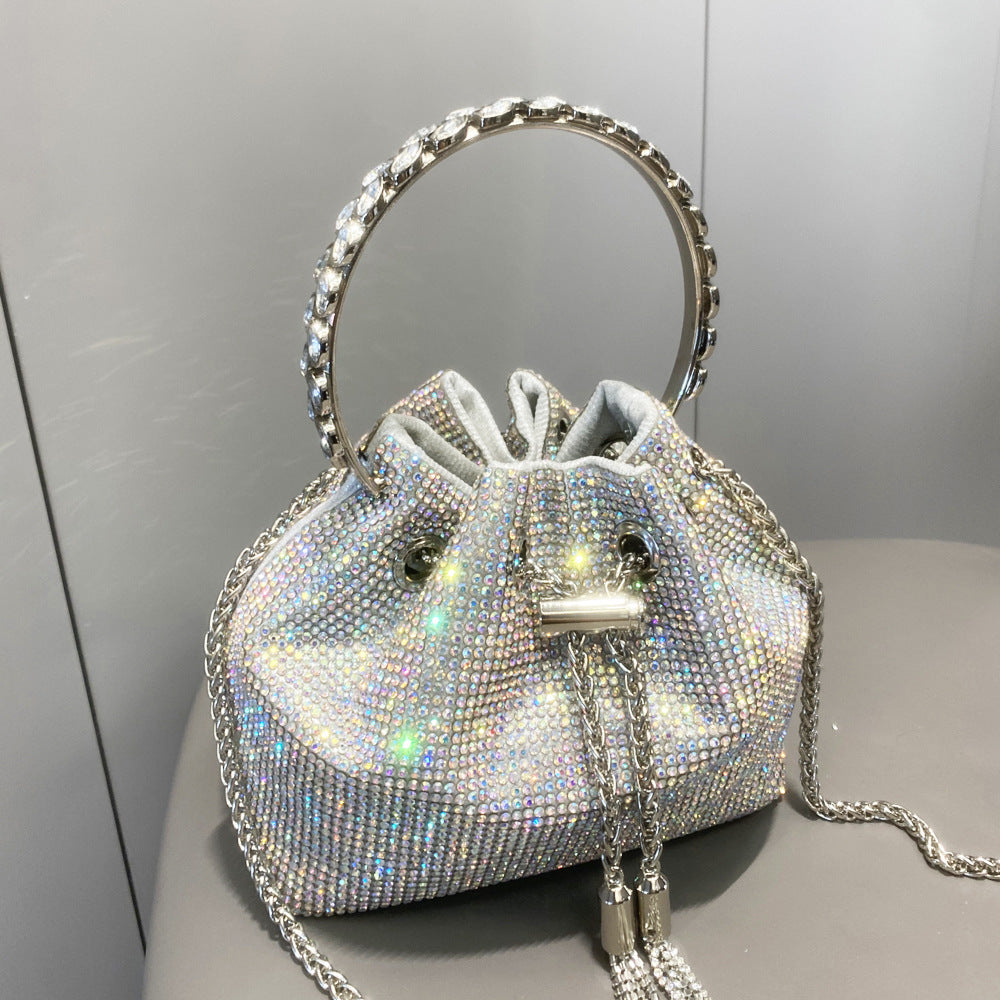 The Starlight Pouch: Full-Crystal Embellished Evening Drawstring Bag | Glamorous Metallic Ring Handle Feminé Luxé