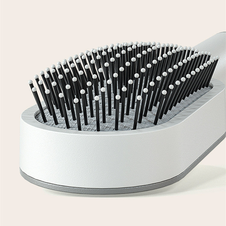The Serenity Glide: One-Key Self-Cleaning Detangler & Scalp Massager Brush Feminé Luxé